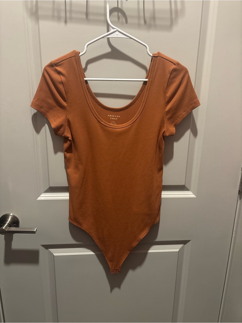 American Eagle Outfitters Short Sleeve Scoop Neck Bodysuit in Rust